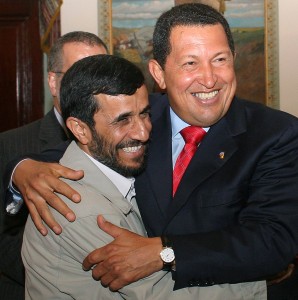 Iran's President Ahmadinejad is welcomed by Venezuela's President Chavez in Caracas